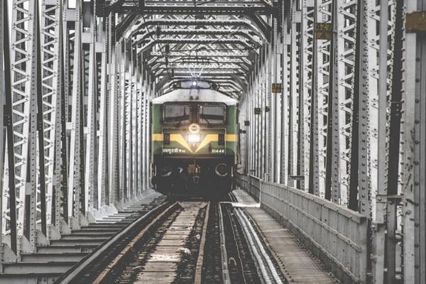 good train engine steel bridge