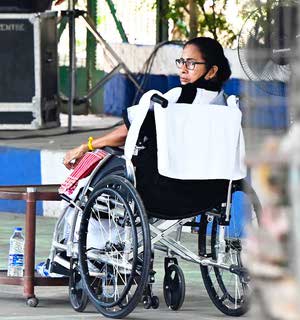 mamata banerjee wheelchair portrait