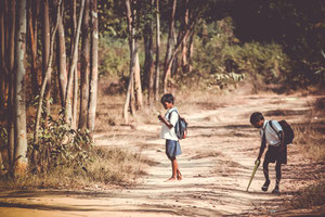 child children bikes cycle play school uniform village